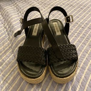 Black braided wedge sandals